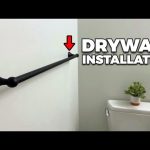 How to Hang a Towel Rack on Drywall